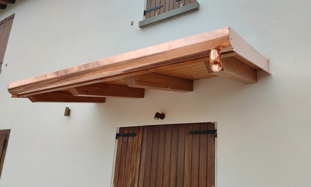 pensilina-in-metallo-per-porta-carpi